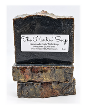 Load image into Gallery viewer, Three stacked bars of The Huntin’ Soap, handmade goats’ milk soap with activated charcoal and rustic earthy marbling from Meadows Bluff Farm.
